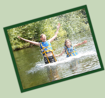 Youth Splashing in the River Wye - Forest Adventure